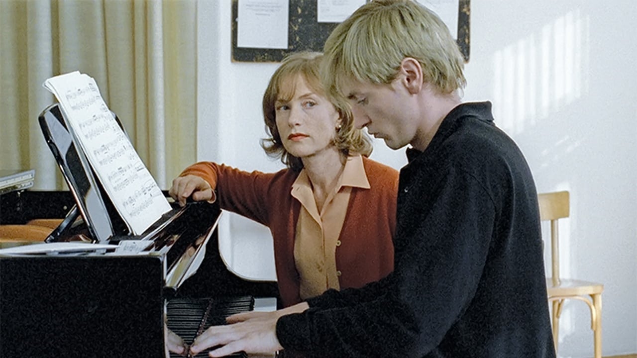 Isabelle Huppert sitter vid ett piano i Pianisten