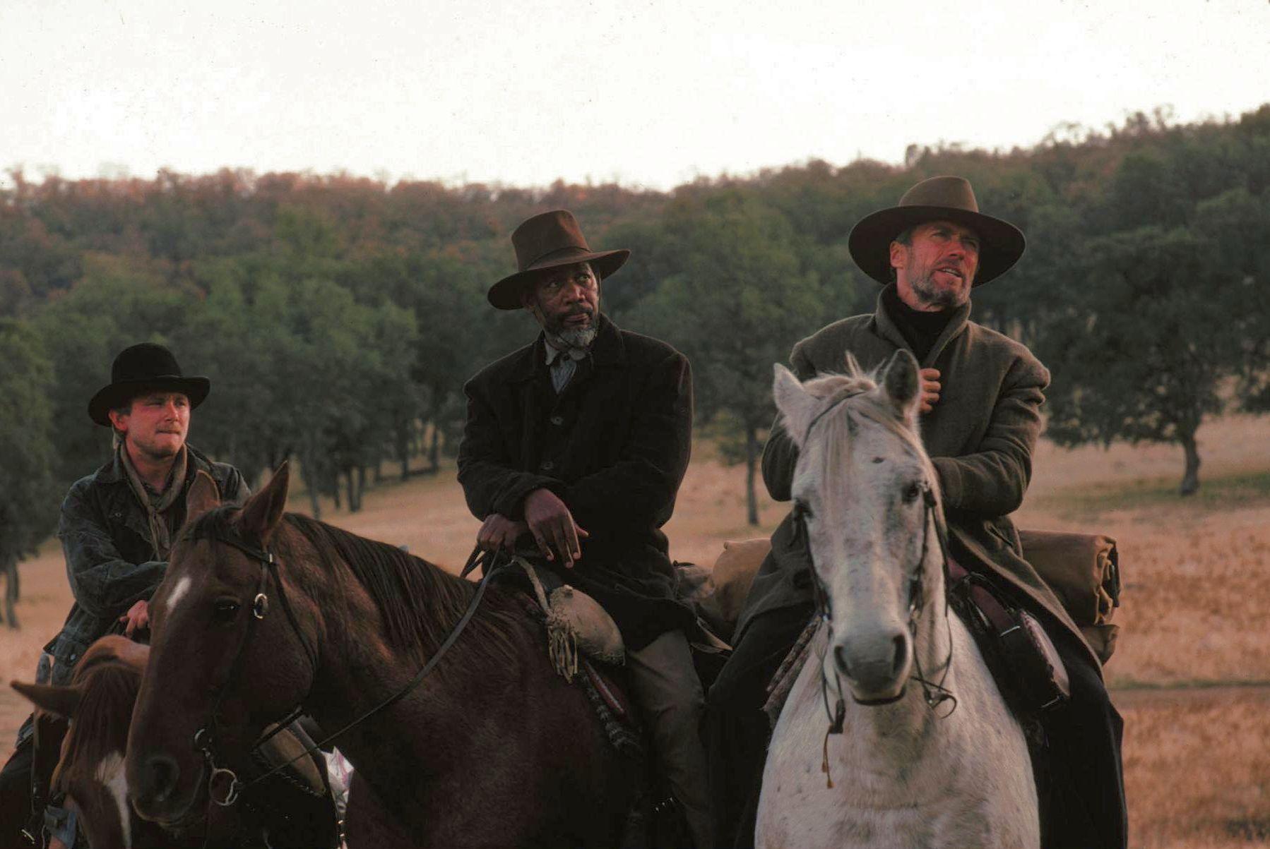 still-of-clint-eastwood,-morgan-freeman-and-jaimz-woolvett-in-de-skoningslösa-(1992)