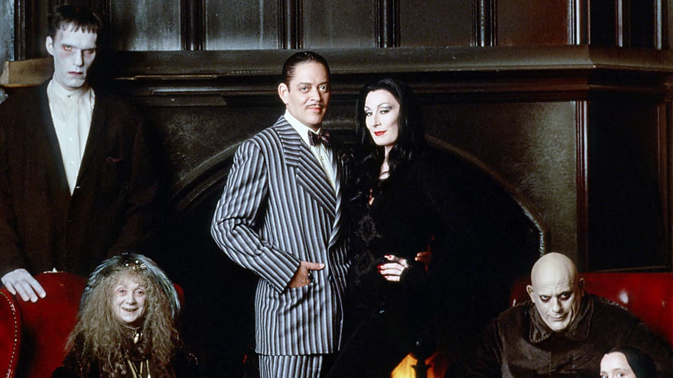 En bild på Addams familjen Luch, Gomez, Morticia och Uncle Fester