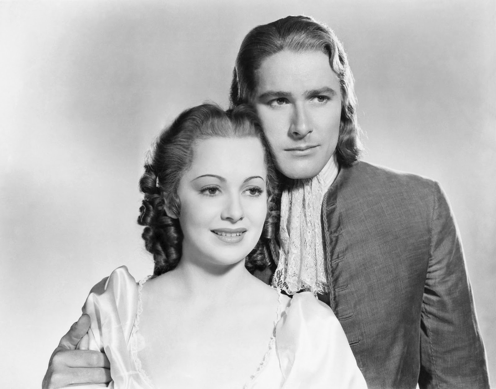 Olivia de Havilland och Errol Flynn i Kapten Blod.