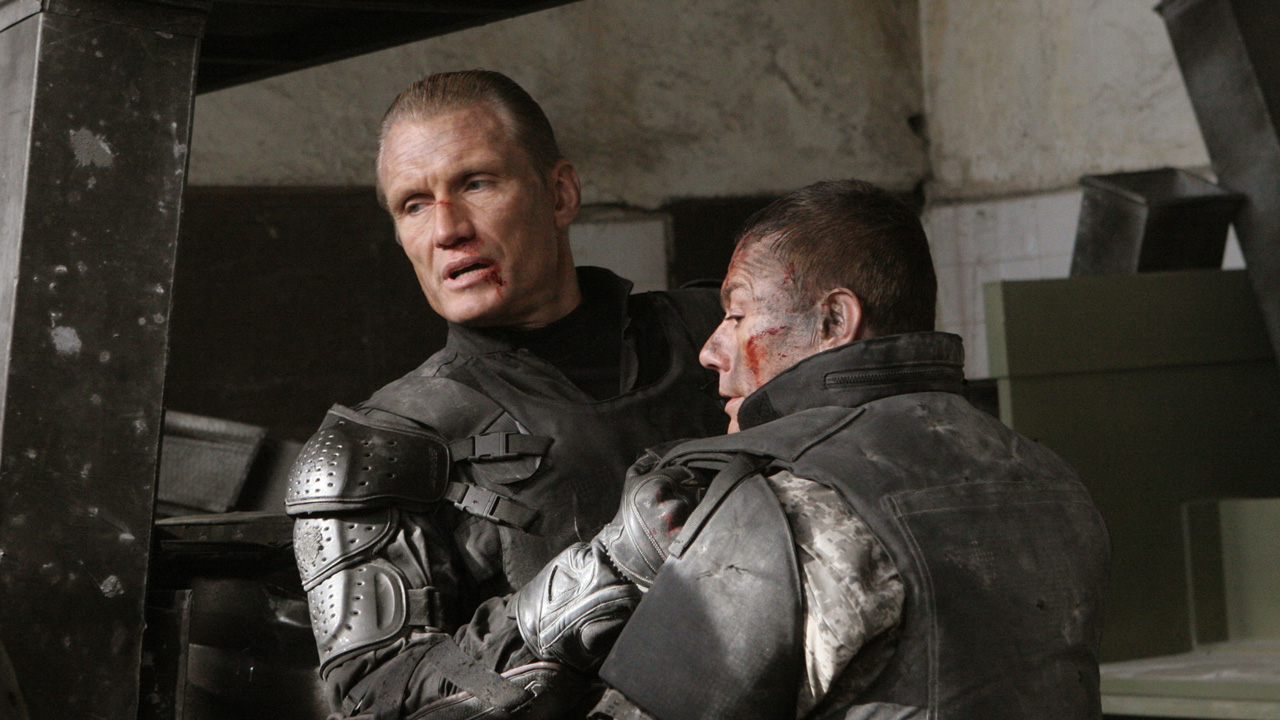 "Kom igen, Klåddan, så får vi den här scenen undanstökad, så bjuder jag på lunch sedan." Jean-Claude van Damme och Dolph Lundgren i Universal Soldier: Day of Reckoning. Foto: Foresight Unlimited Magnet Releasing.